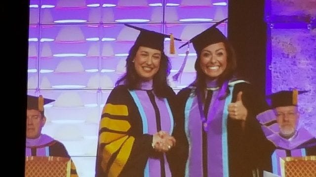 Dr Dawn being awarded the Mastery of General Dentistry